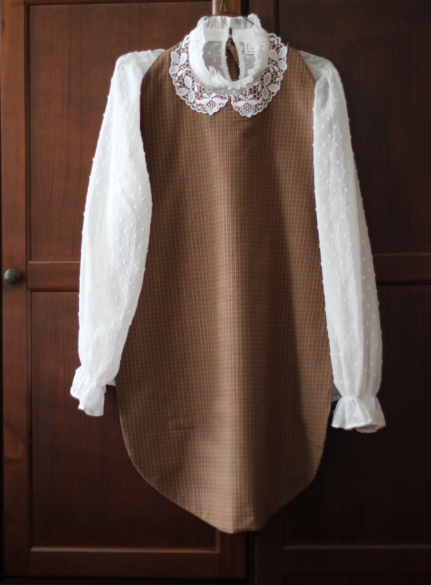 Very Long Homespun Bib trimmed with a lace collar.